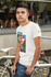 products/t-shirt-sleeve-mockup-of-a-man-leaning-on-a-bike-rack-30874.png