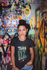 products/tshirt-mockup-of-a-girl-in-a-bathroom-with-graffiti-22279.png