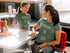 products/mother-and-daughter-wearing-different-tshirts-mockup-while-at-a-diner-restaurant-a15581.png